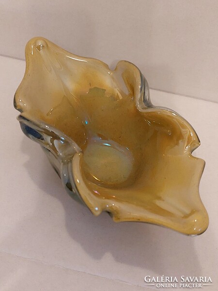 Iridescent broken glass ashtray with polished base.