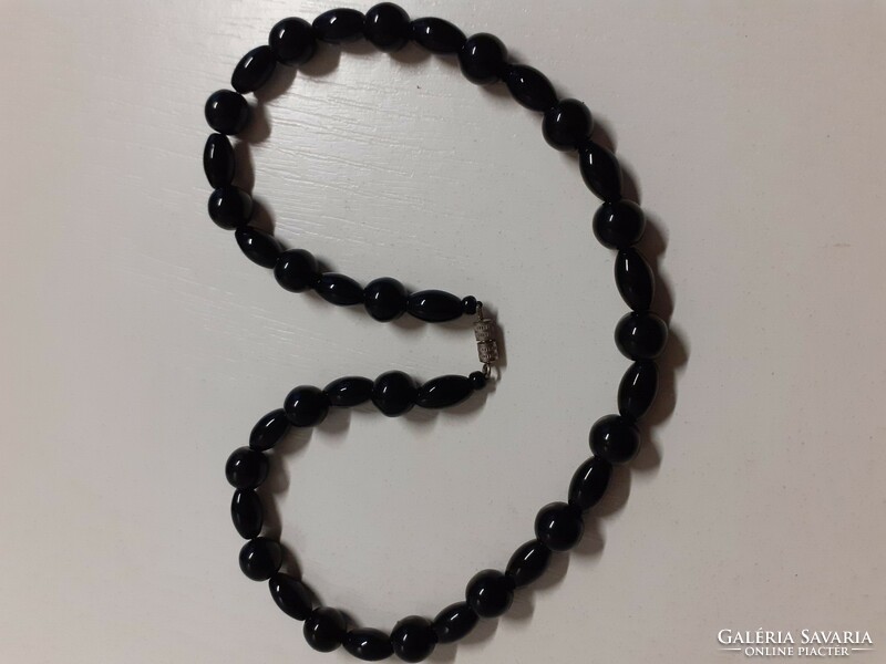 Retro black necklace with screw switch in good condition