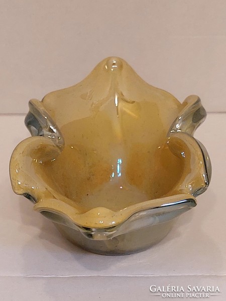Iridescent broken glass ashtray with polished base.