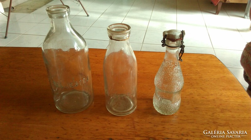 Old bottles of milk and bamboo