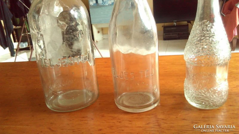 Old bottles of milk and bamboo
