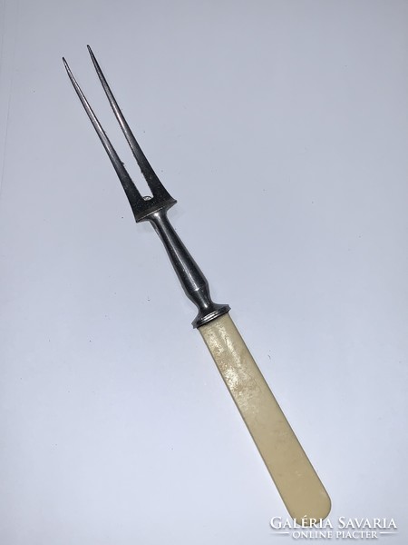 Old meat fork with bone handle