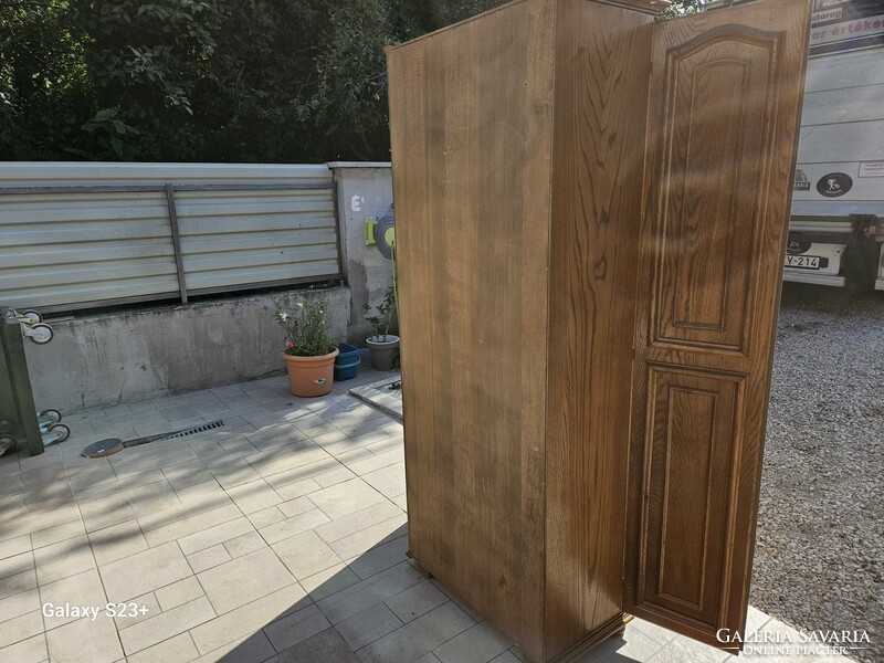 Oak double-door wardrobe in good condition for sale.