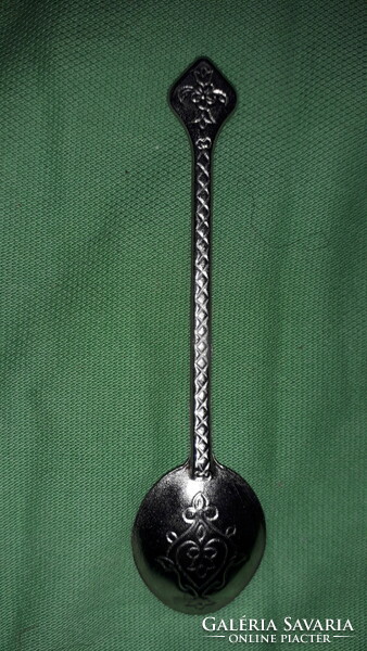 Antique silver-plated alpaca with red stone chiseled engraved pattern, like a decorative spoon according to the pictures