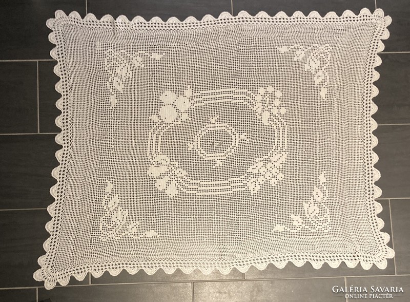 Large hand-crocheted antique tablecloth