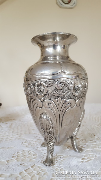 Silver-plated, embossed vase with lion's feet