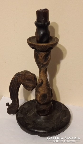 Wooden, carved walking candle holder