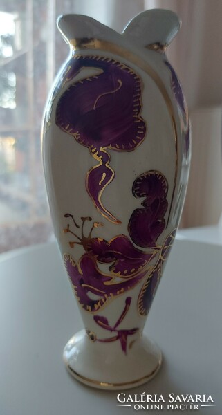 Old gilded porcelain vase