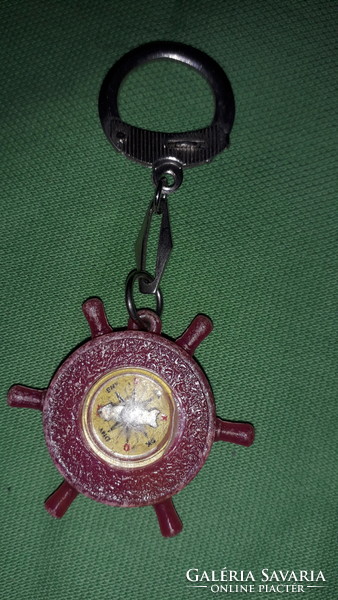 Old Budapest plastic rudder-shaped key holder with compass as shown in the pictures