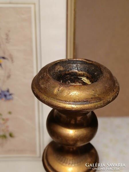 Old brass candle holder with a nice pattern