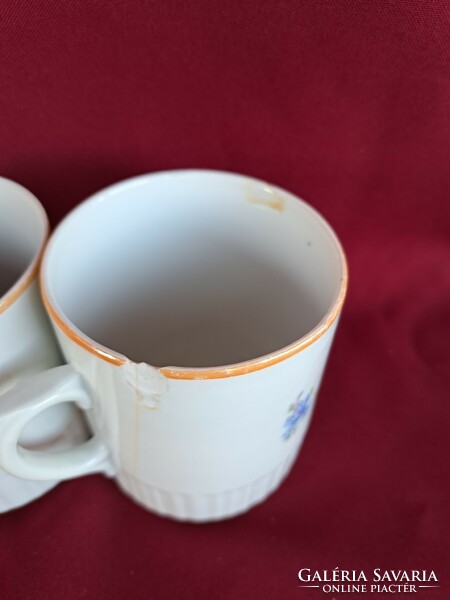 Collectors of Zsolnay forget-me-not porcelain skirted mugs