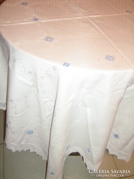 Dreamy embroidered damask tablecloth with crochet edge