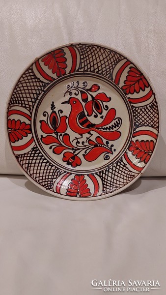 Folk ceramic painted wall bowl, bright red bird