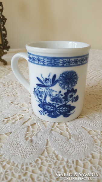 Porcelain mug with onion pattern