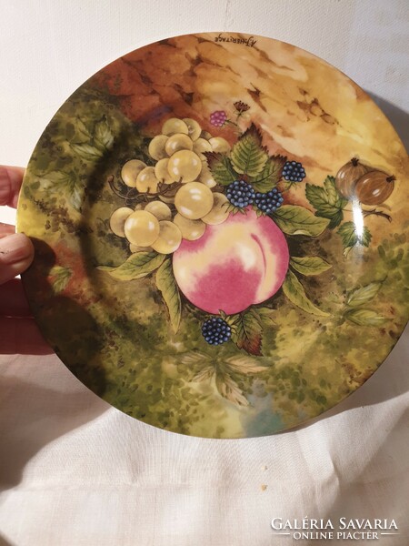 Marked French porcelain wall plate with lemonade