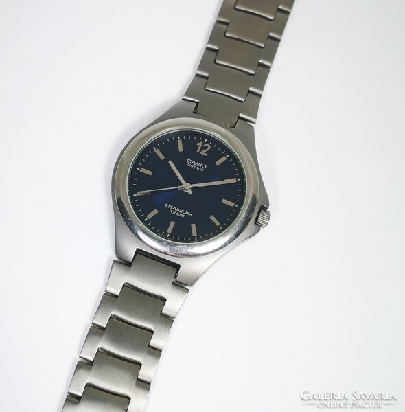 Casio lineage titanium quartz watch! Serviced, with warranty, tiktakwatch service card!