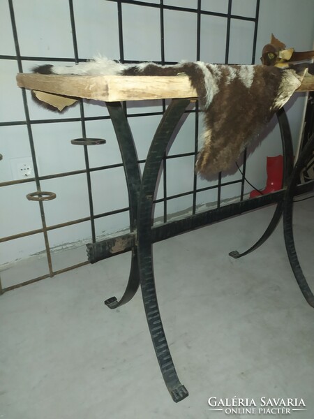 Table with wrought iron legs