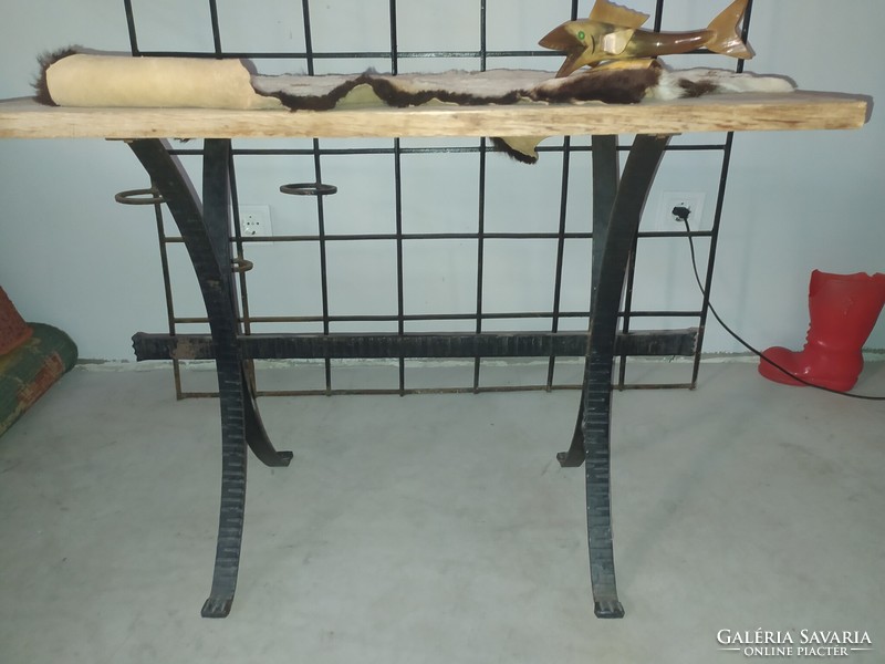 Table with wrought iron legs