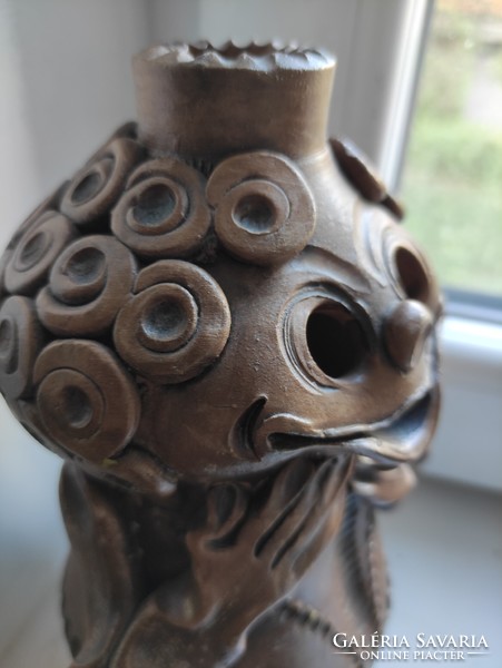 A charming Romanian ceramic vase or candle holder, but never mind Tóbiás, freshly permed, it also sounds great :)