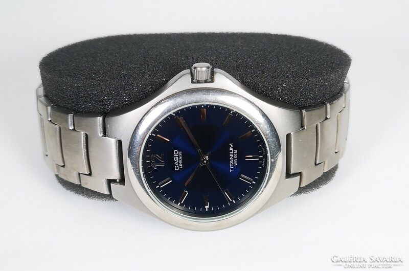 Casio lineage titanium quartz watch! Serviced, with warranty, tiktakwatch service card!