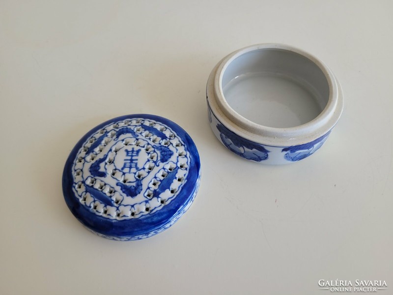 Old oriental porcelain box with a lid, perfume holding jar