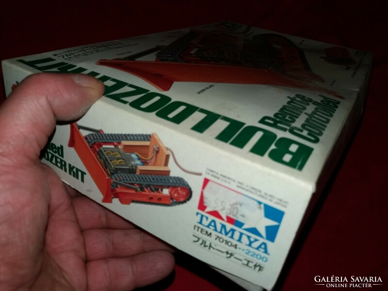 Old battery-powered Tamiya model bulldozer with box as shown in the pictures
