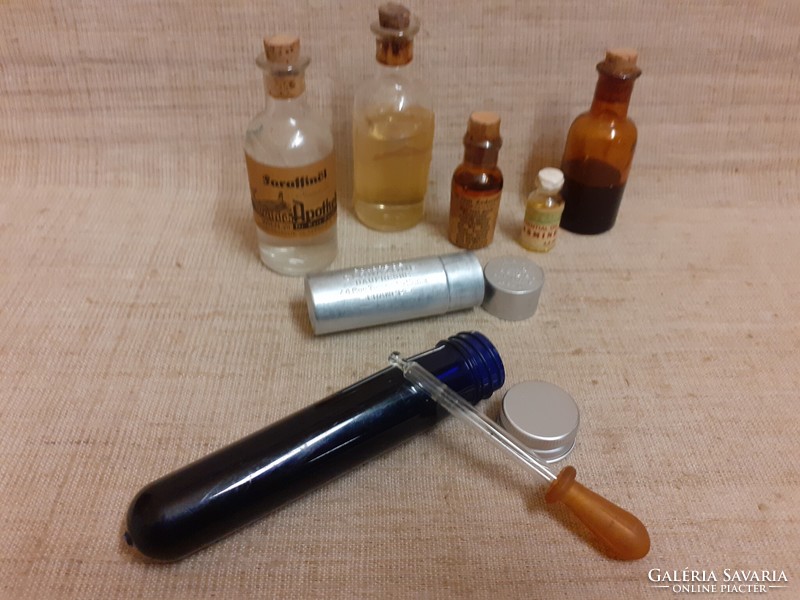 Old metal and other medicine bottles boxes with dropper in one