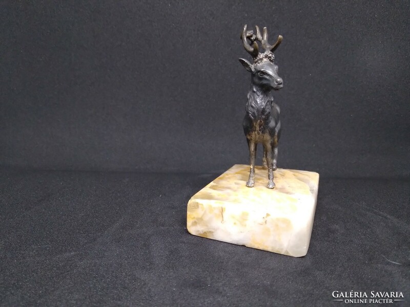 Bronze deer on a marble plinth