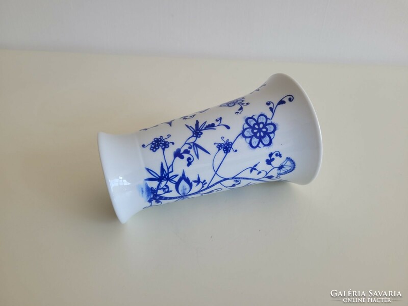 Old porcelain vase with blue flowers