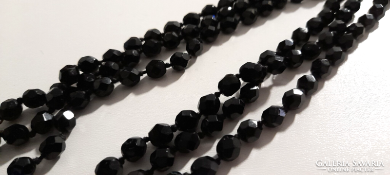 Old extra long black necklace
