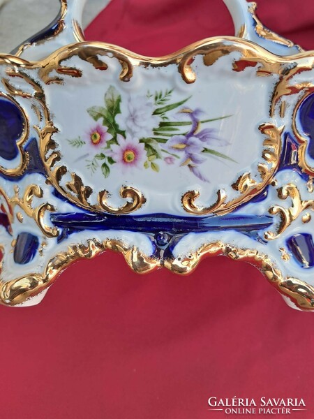 Beautiful porcelain centerpiece offering basket heirloom nostalgia