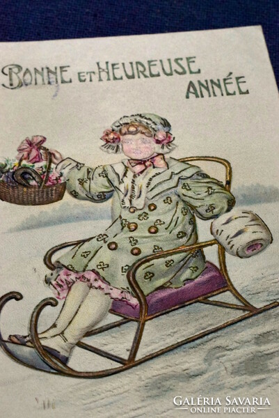 Antique embossed New Year litho postcard - sledding girl with basket clover lucky horseshoe