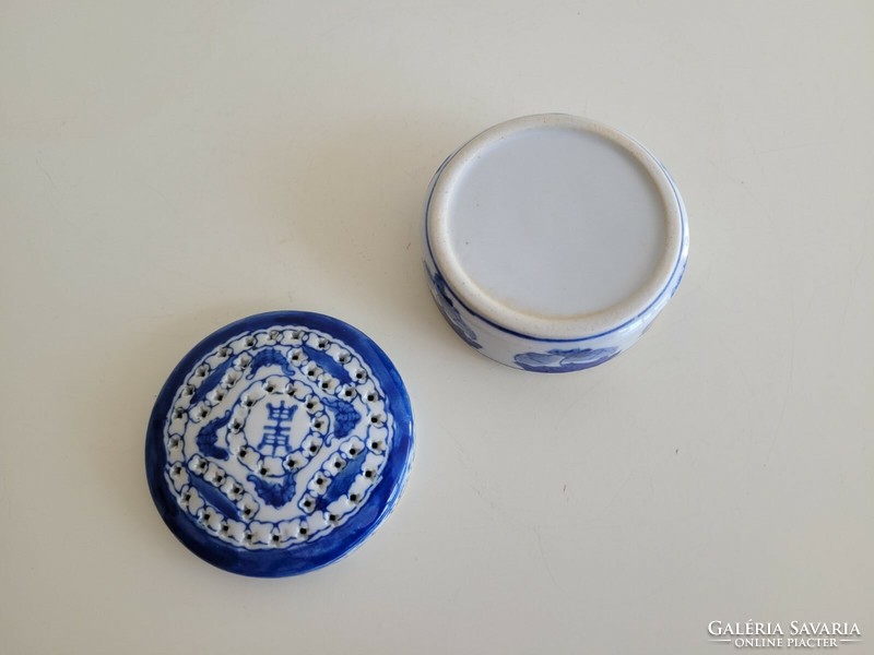 Old oriental porcelain box with a lid, perfume holding jar