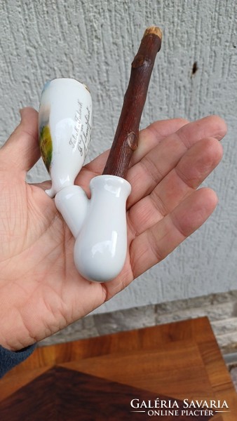Antique pipe, porcelain pipe, with a hunting style sign.