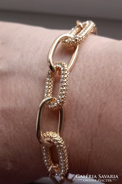 Gold-plated chain bracelet with rhinestones.