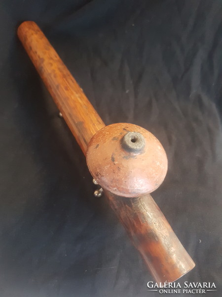 An opium pipe is an old piece, perhaps more than 100 years old