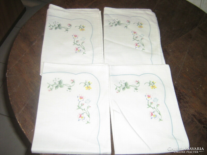 A charming floral napkin in a pastel shade