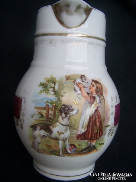 Pitcher - depicting a little girl with dogs. With colorful figural painting and gilding