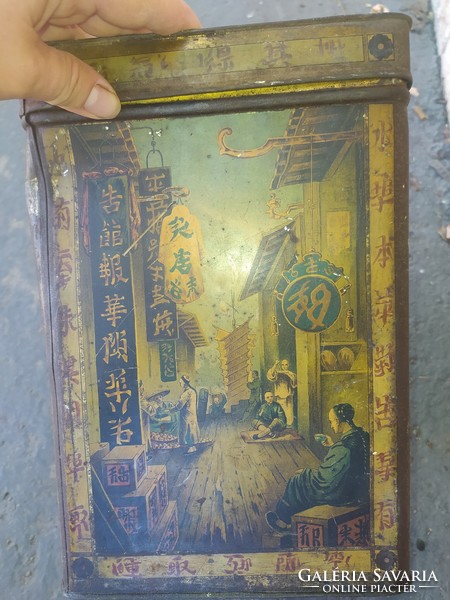 Antique tin tea and cocoa boxes