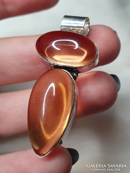 Beautiful silver pendant with a polished agate stone from Botswana