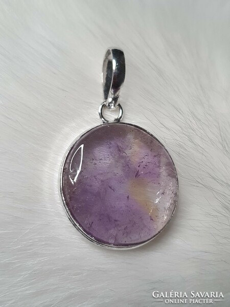 Beautiful silver pendant with a polished auralite stone from Canada