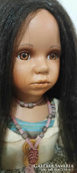 For sale is a damaged porcelain doll (56 cm)