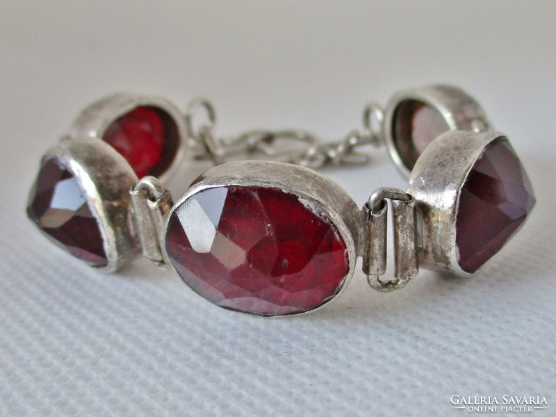 Very nice old silver bracelet with garnet red cast glass stones