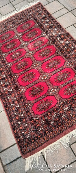 Hand-knotted Bokhara rug. Negotiable.