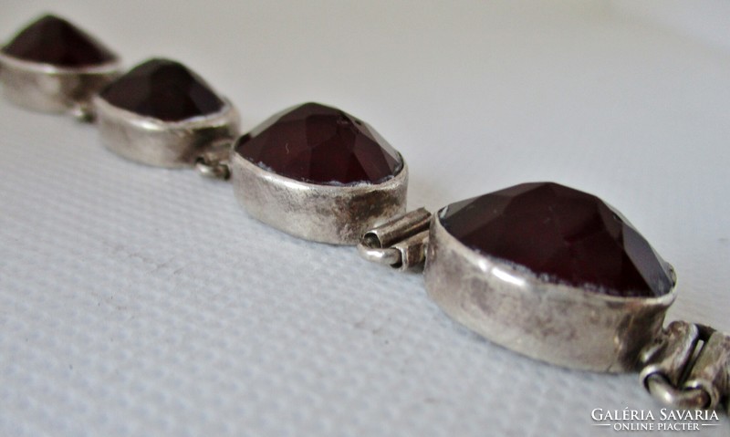 Very nice old silver bracelet with garnet red cast glass stones