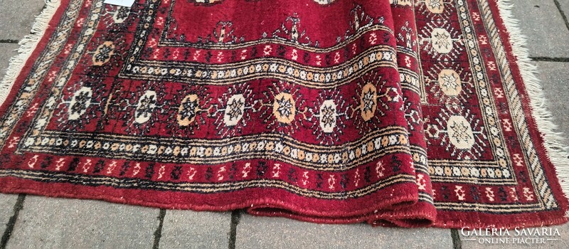 Hand-knotted Bokhara rug. Negotiable.