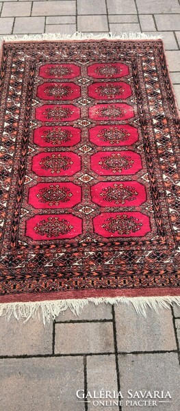 Hand-knotted Bokhara rug. Negotiable.