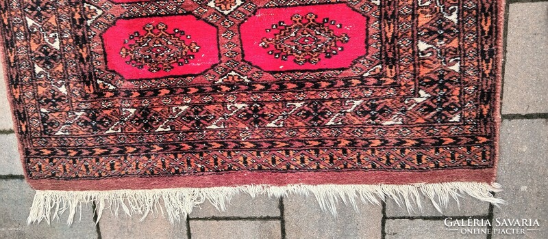 Hand-knotted Bokhara rug. Negotiable.