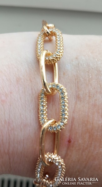 Gold-plated chain bracelet with rhinestones.