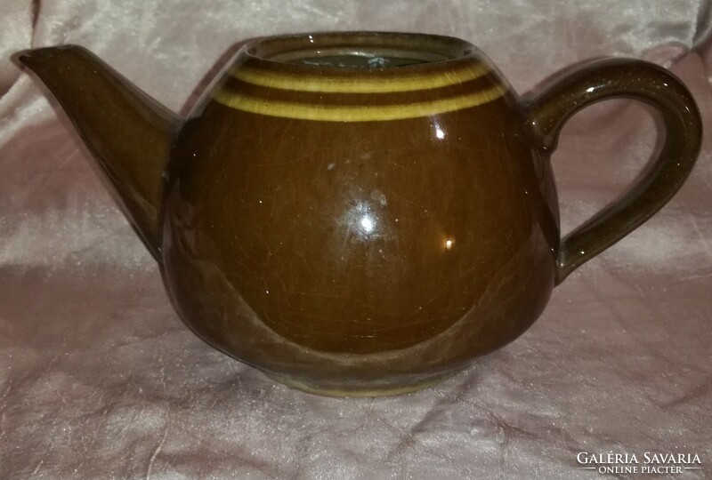 Old porcelain teapot without lid